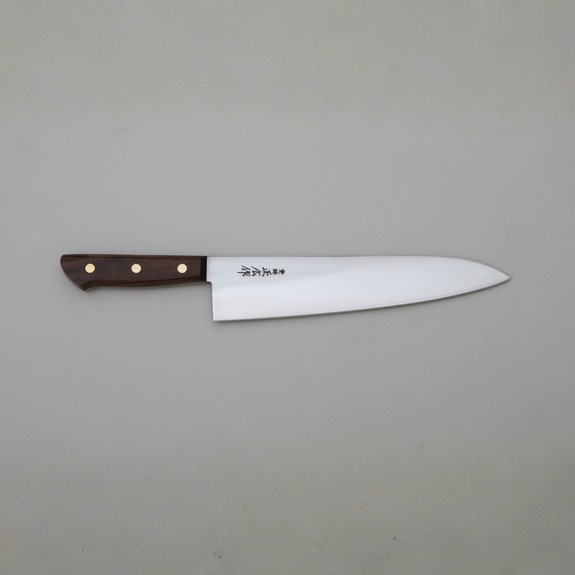 Knife with a wooden handle on a gray background