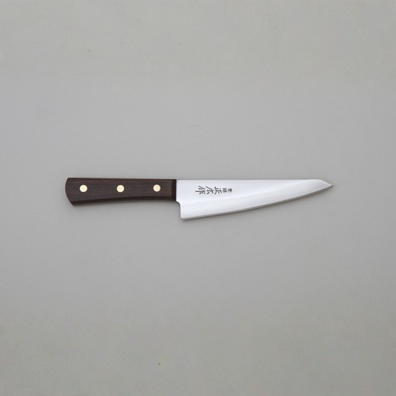 Knife with a wooden handle on a gray background