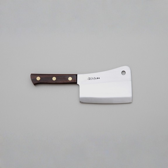 Meat cleaver with a wooden handle on a gray background