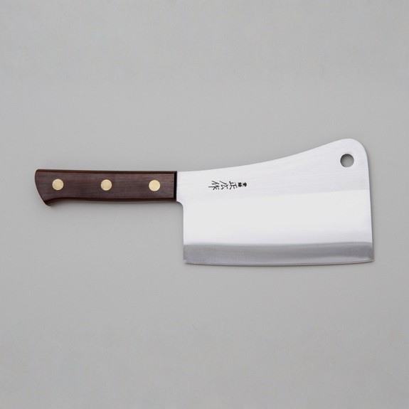 Butcher knife with wooden handle on a gray background