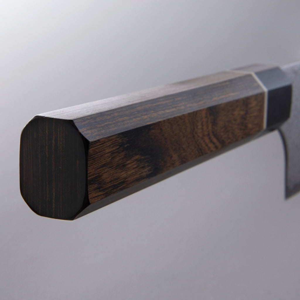 Wooden handle on a metallic surface
